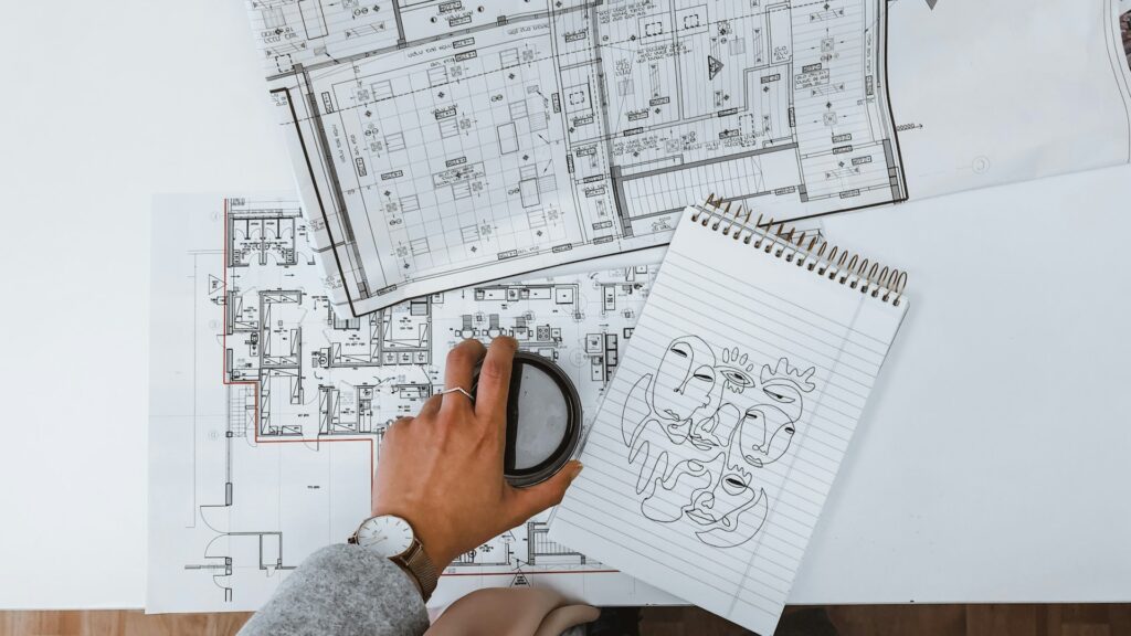 Permit expediter reviewing construction plans